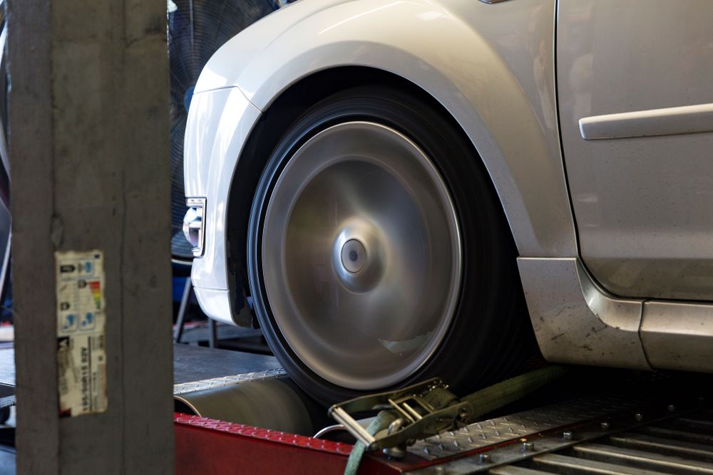 close up of wheel spinning on a dyno