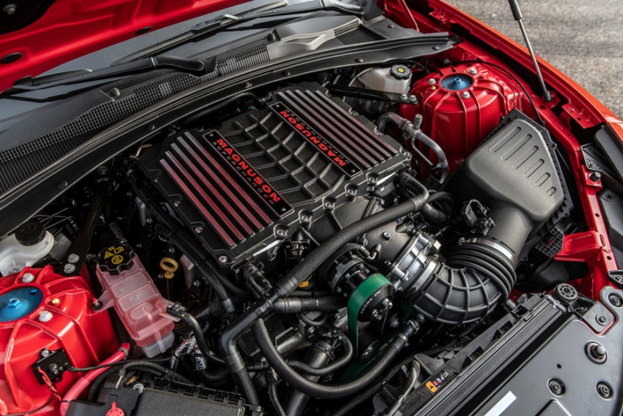 An aerial engine shot of a red Hennessey Exorcist Camaro ZL