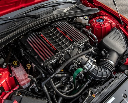 An aerial engine shot of a red Hennessey Exorcist Camaro ZL