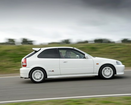 Side driving shot of civic