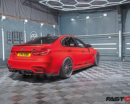 rear 3/4 shot of modified bmw f80 m3