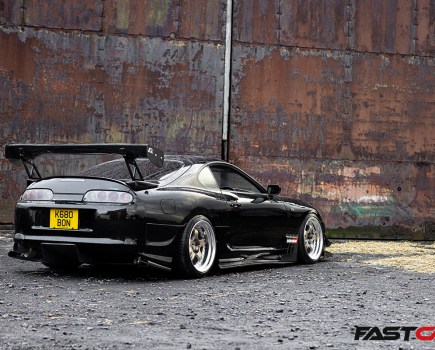 rear 3/4 shot of modified toyota supra mk4