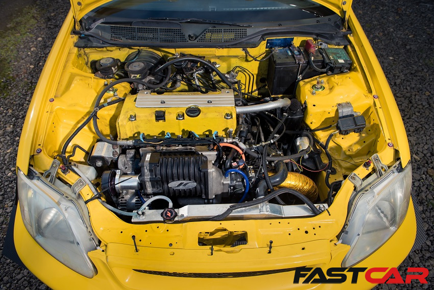 These days, you'll find a supercharger in the Civic's engine bay.