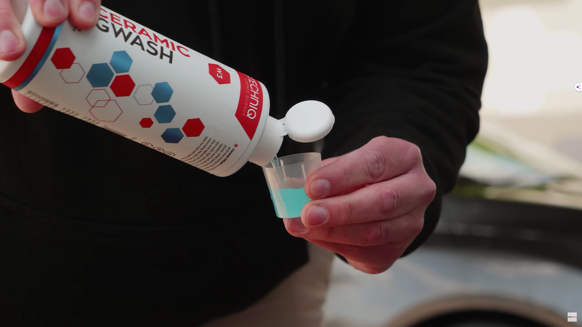 pouring Ceramic GWash into measuring cap